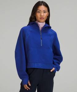 Why do certain Lululemon Scuba Oversized Half-Zip colors remain strictly confined to the North American market?
