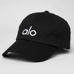 Does sourcing the Alo Yoga Wellness 90s Cap from the US actually simplify your 2026 wardrobe logistics?