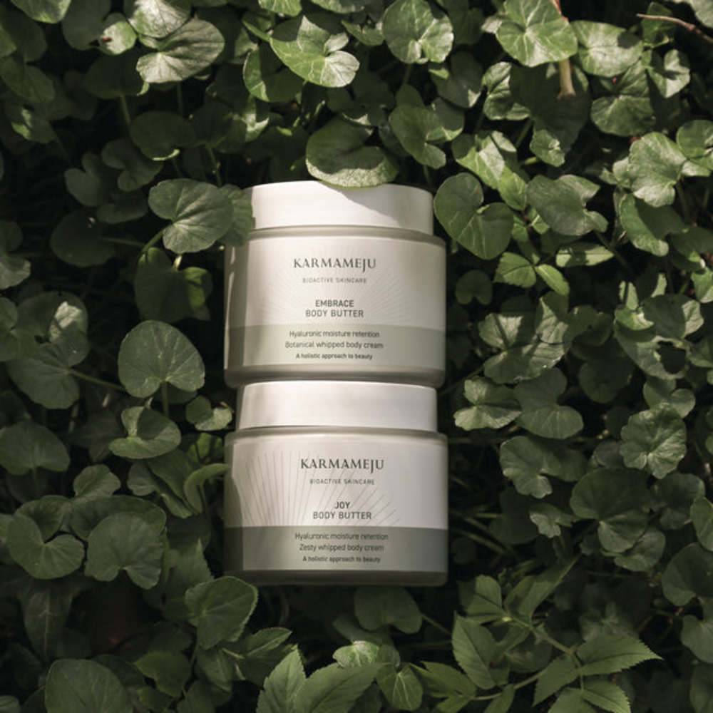 Does the Amika Big Embrace Body Butter justify the $28 premium for immediate access in Spain?