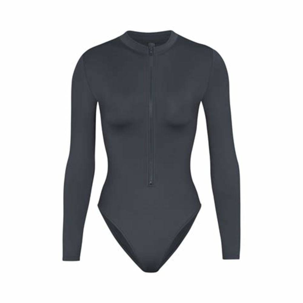 Skims USA vs AU Local Stock: Get the 2026 Long Sleeve Zip Front One Piece now