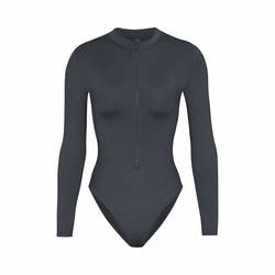 Skims USA vs AU Local Stock: Get the 2026 Long Sleeve Zip Front One Piece now