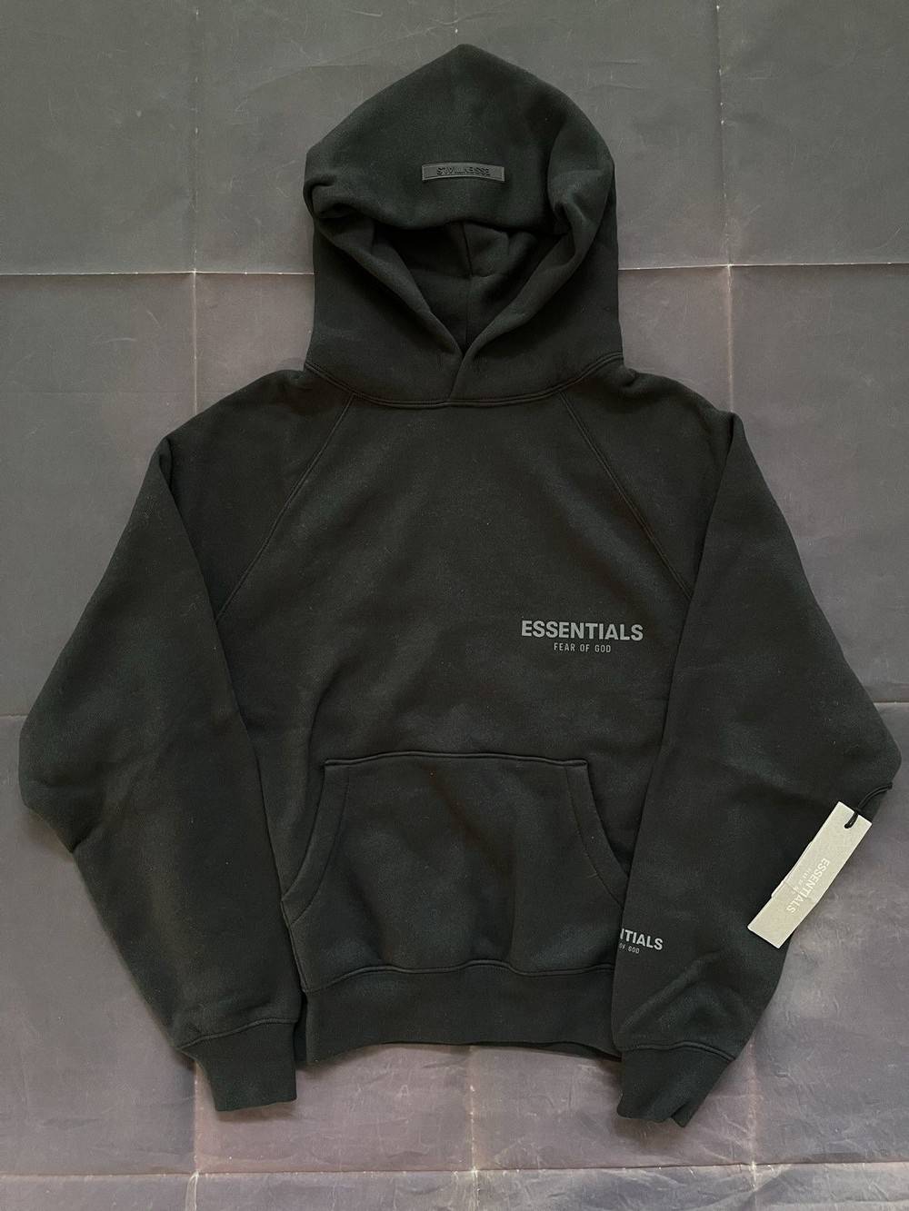 The price gap for Fear of God Essentials 2026 hoodies in the US versus the United Arab Emirates