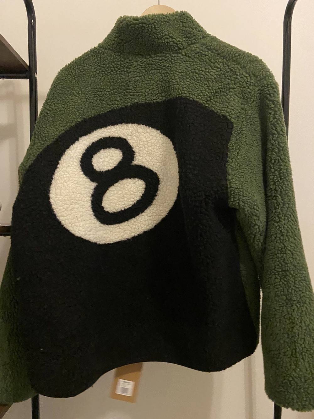 The current availability of the Stüssy US-Exclusive 8-Ball Sherpa for French residents is a time-sensitive logistical problem
