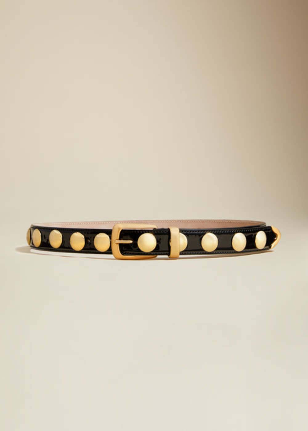 Securing the Khaite Gold Hammered Belt in Switzerland requires a specific logistical framework